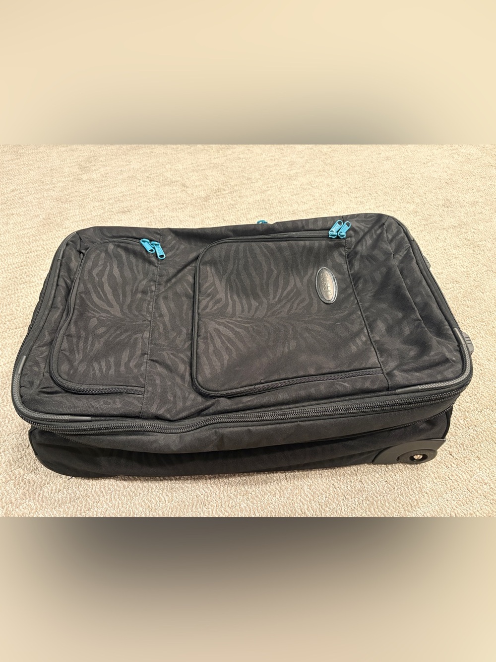 Dakine Black Zebra-Pattern Travel Duffel with Teal Zippers